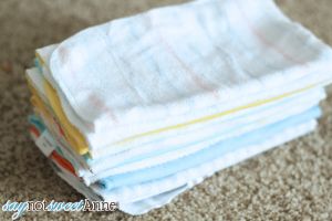 Easy DIY Baby Wipes + Wipe Spray. Awesome pop-up trick makes them easy to grab with one hand! | saynotsweetanne.com